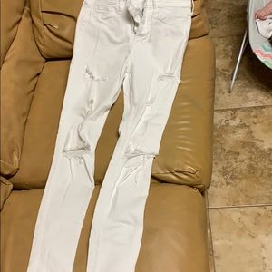 Super Skinny white ripped jeans